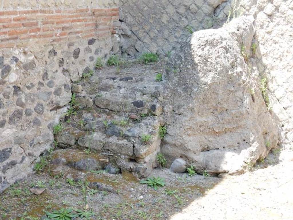 IV.20, Herculaneum. May 2018. Steps in south-west corner, leading to a mezzanine room. Photo courtesy of Buzz Ferebee.